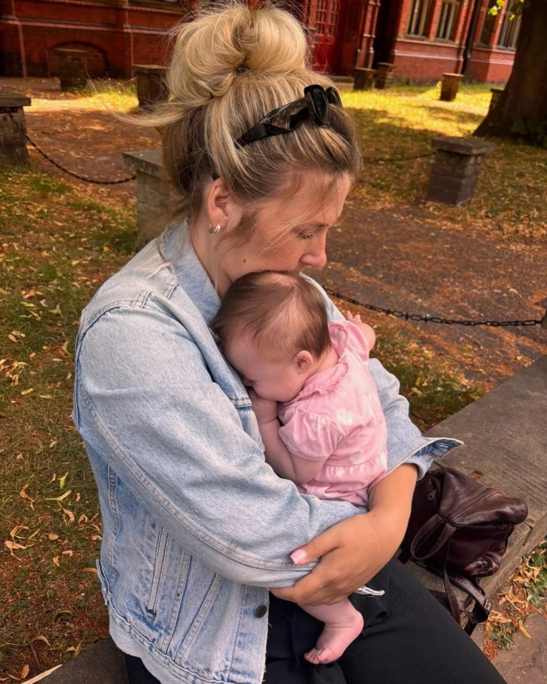 Concept image of mother and child playing; replace with a genuine photo of Mariah and Gracie